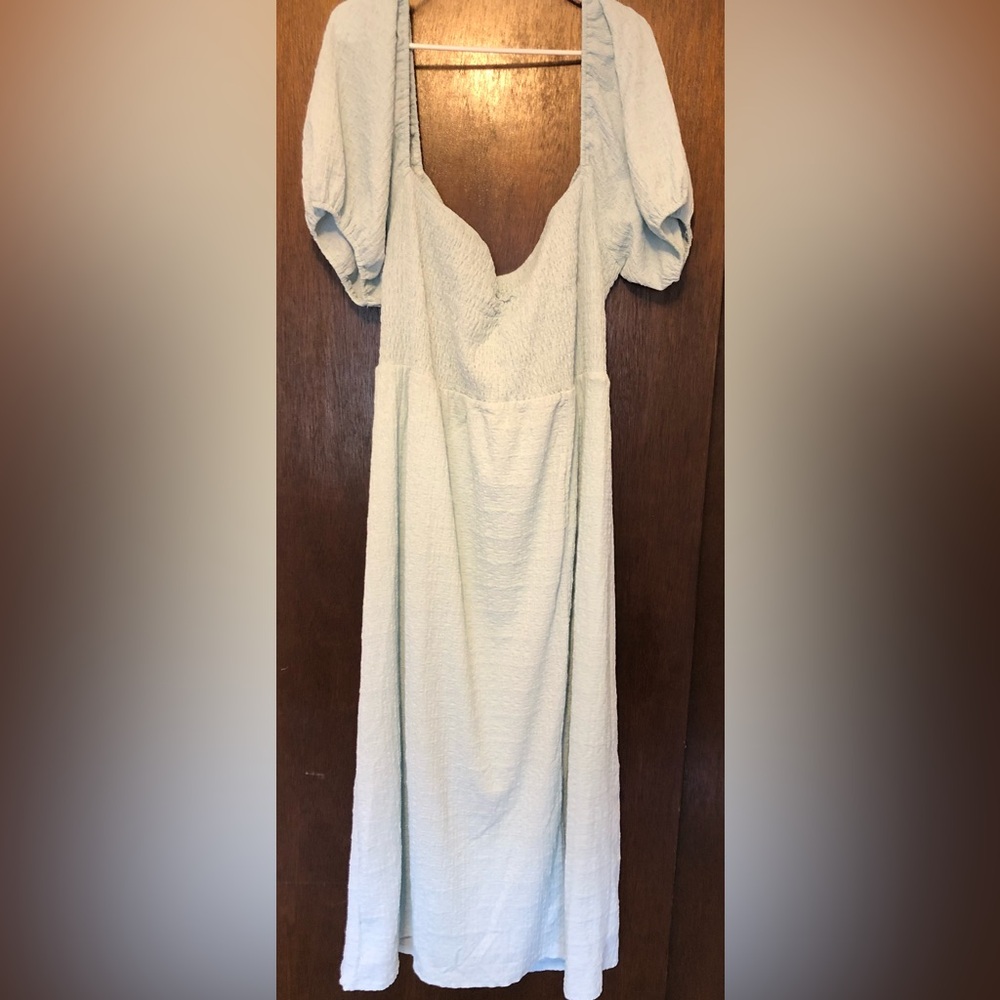 Boutique baby blue dress with puffed sleeves and cross-criss back. Adorable! - Picture 4 of 6